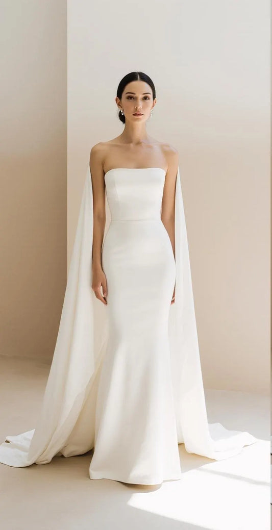 Elegant Strapless Mermaid Wedding Dress with Long Train and Flowing Cape – Maison Bridal