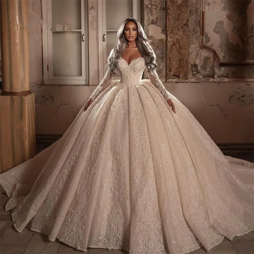 On Zhu Customized Luxury Ball Gown Wedding Dresses Beadings Sweetheart Appliques Sequins Long Sleeves Sweep Train Bridal Dresses